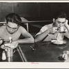 Rupert, Idaho. Former CCC (Civilian Conservation Corps) camp now under FSA (Farm Security Administration) management. Japanese-Americans eating supper in the community mess hall