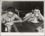 Rupert, Idaho. Former CCC (Civilian Conservation Corps) camp now under FSA (Farm Security Administration) management. Japanese-Americans eating supper in the community mess hall