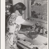 Ola, Idaho. The wife of a member of the Ola self-help cooperative washing berries. Running water in the house is a very recent improvement for this family