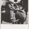 Ola, Idaho. Detail of cowboy on horseback