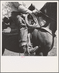 Ola, Idaho. Detail of cowboy on horseback