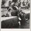 Rupert, Idaho. Dressing after swimming