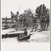 Rupert, Idaho. Dressing after swimming