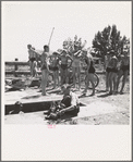 Rupert, Idaho. Dressing after swimming