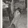 Daughter of agricultural day laborer and his tubercular wife in bedroom of shack home on Poteau Creek near Spiro, Oklahoma