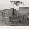 Clothes and tent of itinerant statue maker and agricultural day laborer living on Poteau Creek near Spiro, Oklahoma. Sequoyah County