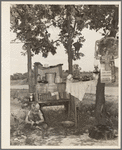 Family camped in the open near Spiro, Oklahoma. Sequoyah County