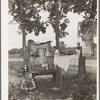 Family camped in the open near Spiro, Oklahoma. Sequoyah County