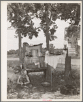 Family camped in the open near Spiro, Oklahoma. Sequoyah County