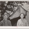 Old couple who have moved into tent home near Sallisaw, Oklahoma, in order to save rent and cost of wood in town