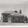 Old schoolhouse in Akins, Oklahoma. This town was formerly a cotton ginning center as well as trading center for the surrounding farm community. There is no ginning done there now and it has assumed the status of a ghost town