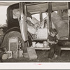 Belongings of migrant family packed in and around car near Muskogee, Oklahoma. Muskogee County