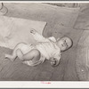 Baby of agricultural day laborer living north of Sallisaw, Oklahoma. Sequoyah County