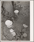 Dishes left by the migrant family at their homestead near Muskogee, Oklahoma