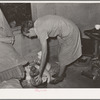 Taking the family lamp along with them to California from Muskogee, Oklahoma