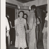 Young couple at square dance in rural section of hills near McAlester, Pittsburg County, Oklahoma. Sharecropper's home