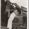 Migrant family loading truck preparatory to departure for California. Near Muskogee, Oklahoma