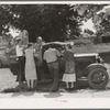 The Elmer Thomas family at Muskogee visiting their friends to say goodbye before leaving as migrants to California. Oklahoma