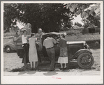 The Elmer Thomas family at Muskogee visiting their friends to say goodbye before leaving as migrants to California. Oklahoma