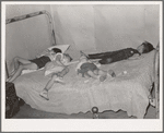 Children asleep on bed at square dance in hills near McAlester on Saturday night in home of sharecropper. Oklahoma, Pittsburg County