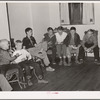 Children singing at boys' camp fireside meeting. El Porvenir, New Mexico