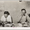 Men eating dinner at family-style restaurant. Muskogee, Oklahoma