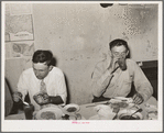 Men eating dinner at family-style restaurant. Muskogee, Oklahoma