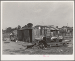 Shack home of family living in community camp. Oklahoma City, Oklahoma. Refer to general caption no. 21