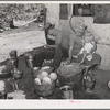 Family living in Mays Avenue camp. Oklahoma City, Oklahoma. This family had been farmers in Oklahoma until four years ago