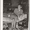 Daughter of family living in Mays Avenue camp. Oklahoma City, Oklahoma. This family had been farmers in Oklahoma until four years ago