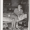Daughter of family living in Mays Avenue camp. Oklahoma City, Oklahoma. This family had been farmers in Oklahoma until four years ago