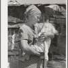 Mother and child in front of shack in Mays Avenue camp. Oklahoma City, Oklahoma. Refer to general caption no. 21