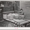 Tenant farmer loading melons and vegetables on his truck for delivery into market at Muskogee, Oklahoma. This year many vegetables were brought back from town when prices offered were ruinessly low and were there fed to hogs. Refer to general caption numb