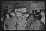 Johnnie Ray [center] and unidentified others at the opening night of the stage production Fiorello!