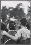 Shakespeare in the Park, young couple in audience