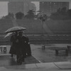 People in the rain at the East River Park Amphitheatre