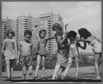 Unidentified actress plays with children at the East River Park Amphitheatre during the run of The Taming of the Shrew