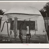 Harness and rope on back of covered trailer in Mays Avenue camp. Oklahoma City, Oklahoma