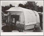 Covered trailer in community camp. Oklahoma City, Oklahoma