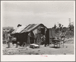 Shack of family living in Mays Avenue camp. Oklahoma City, Oklahoma