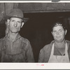 Father and mother of large family who make their living by collecting old vegetable crates and selling them to others in camp for building material. Camp near Mays Avenue, Oklahoma City, Oklahoma