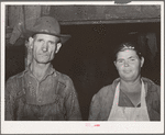 Father and mother of large family who make their living by collecting old vegetable crates and selling them to others in camp for building material. Camp near Mays Avenue, Oklahoma City, Oklahoma