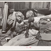 Children of Mays Avenue camp. Oklahoma City, Oklahoma. Their father is a trasher and they are playing with some things he picked up