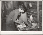 Resident of Mays Avenue camp making biscuits. Oklahoma City, Oklahoma