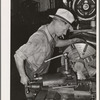 Machinist working at lathe. Seminole, Oklahoma, oil refinery