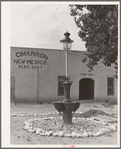Town hall and light standard. Cimarron, New Mexico