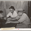 Domino players. Seminole oil field, Oklahoma