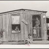 Home and family of oil field roustabout. Oklahoma City, Oklahoma. During periods of unemployment the woman takes in washing and ironing