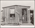 Home and family of oil field roustabout. Oklahoma City, Oklahoma. During periods of unemployment the woman takes in washing and ironing