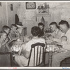 Family of unemployed oil worker, who is now living on relief, eating supper. Seminole, Oklahoma